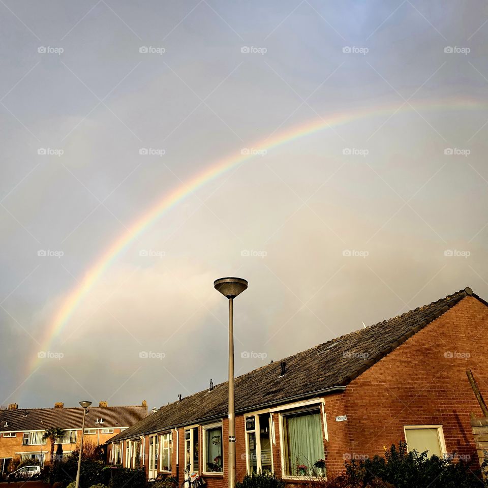 rainbow high in the sky