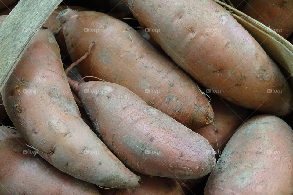 Sweet potatoes at produce stand 