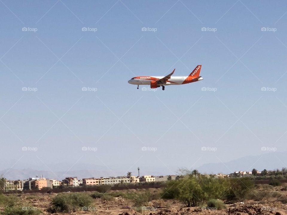 beautiful aircraft flying cross the blue sky