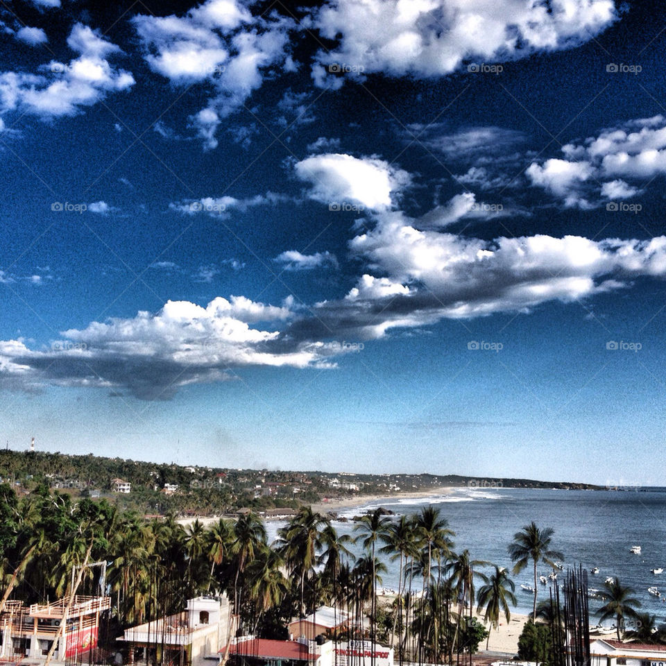 puerto escondido oaxaca mexico beach sky palm trees by jesus