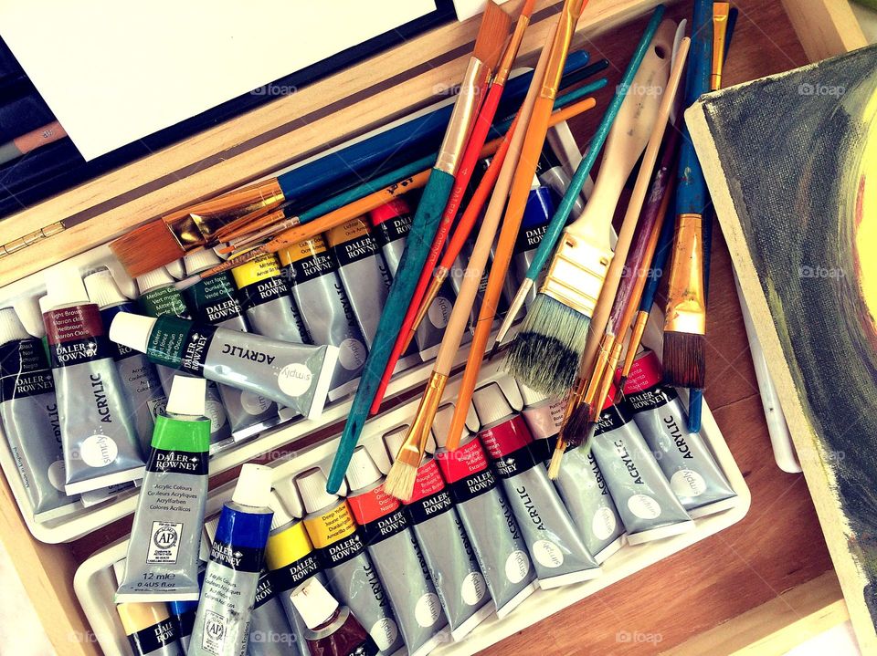 Brushes, paint, canvas 