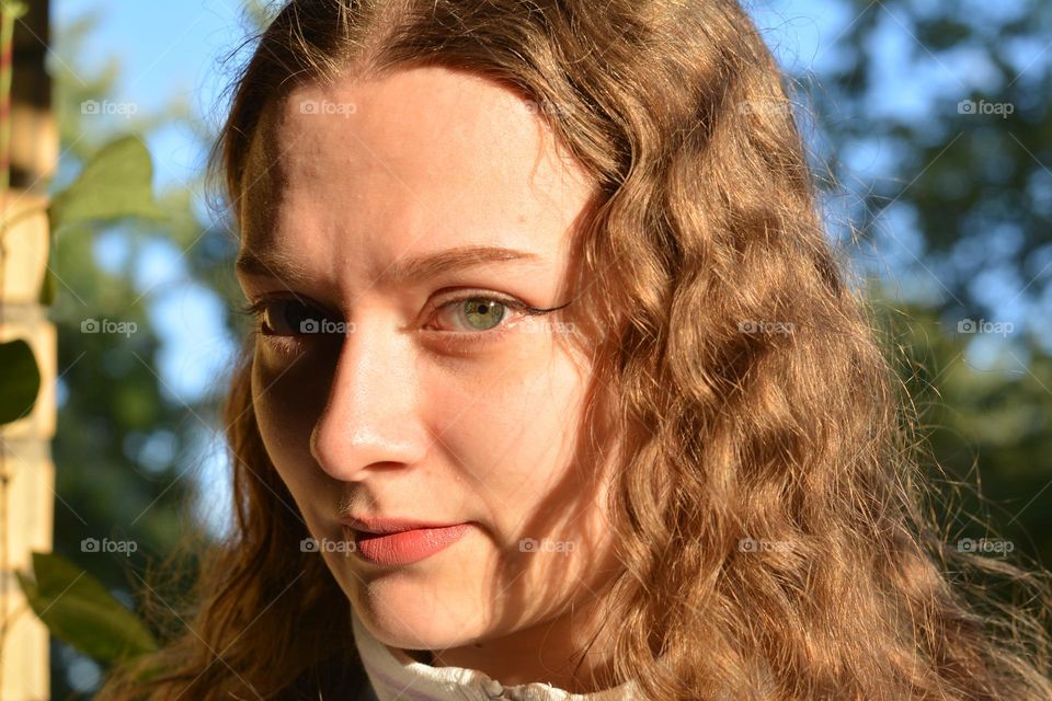 young girl beautiful portrait in sunlight