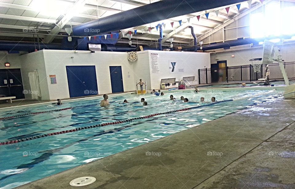 Swimming lessons . Watching the kids learn