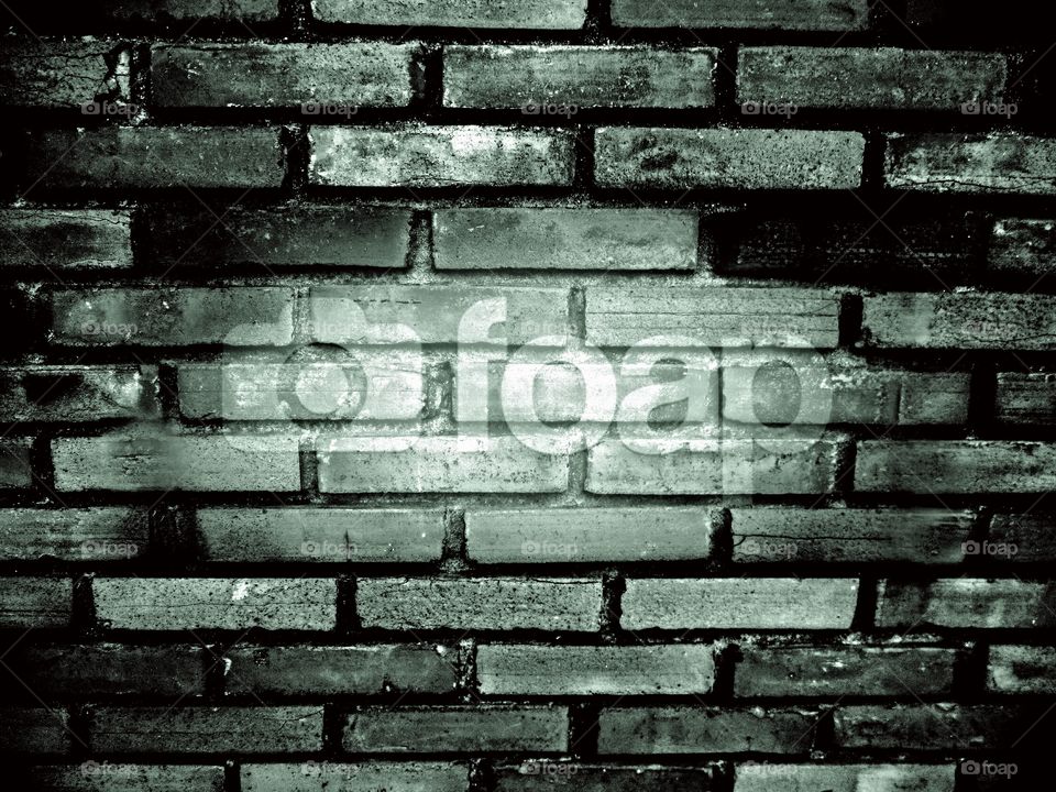 Foap on brick wall. foap logo on old brick wall edit on mobile phone