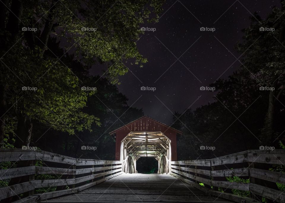 Night time covered bridge
