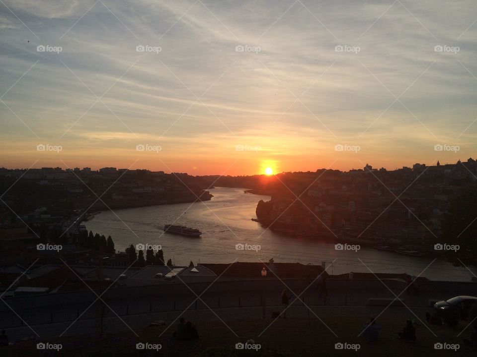 Scenic view of river during sunset