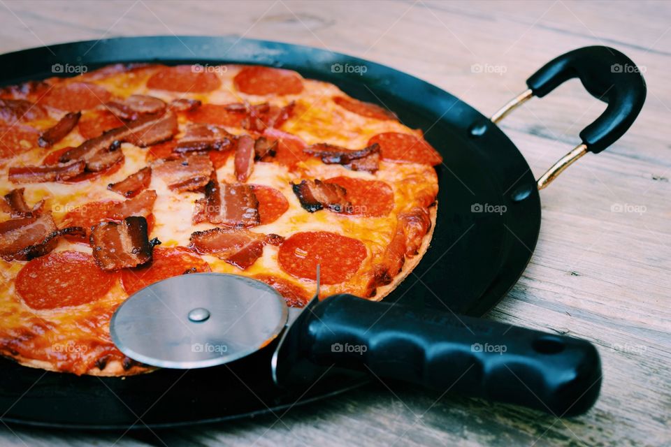 Pizza topped with bacon