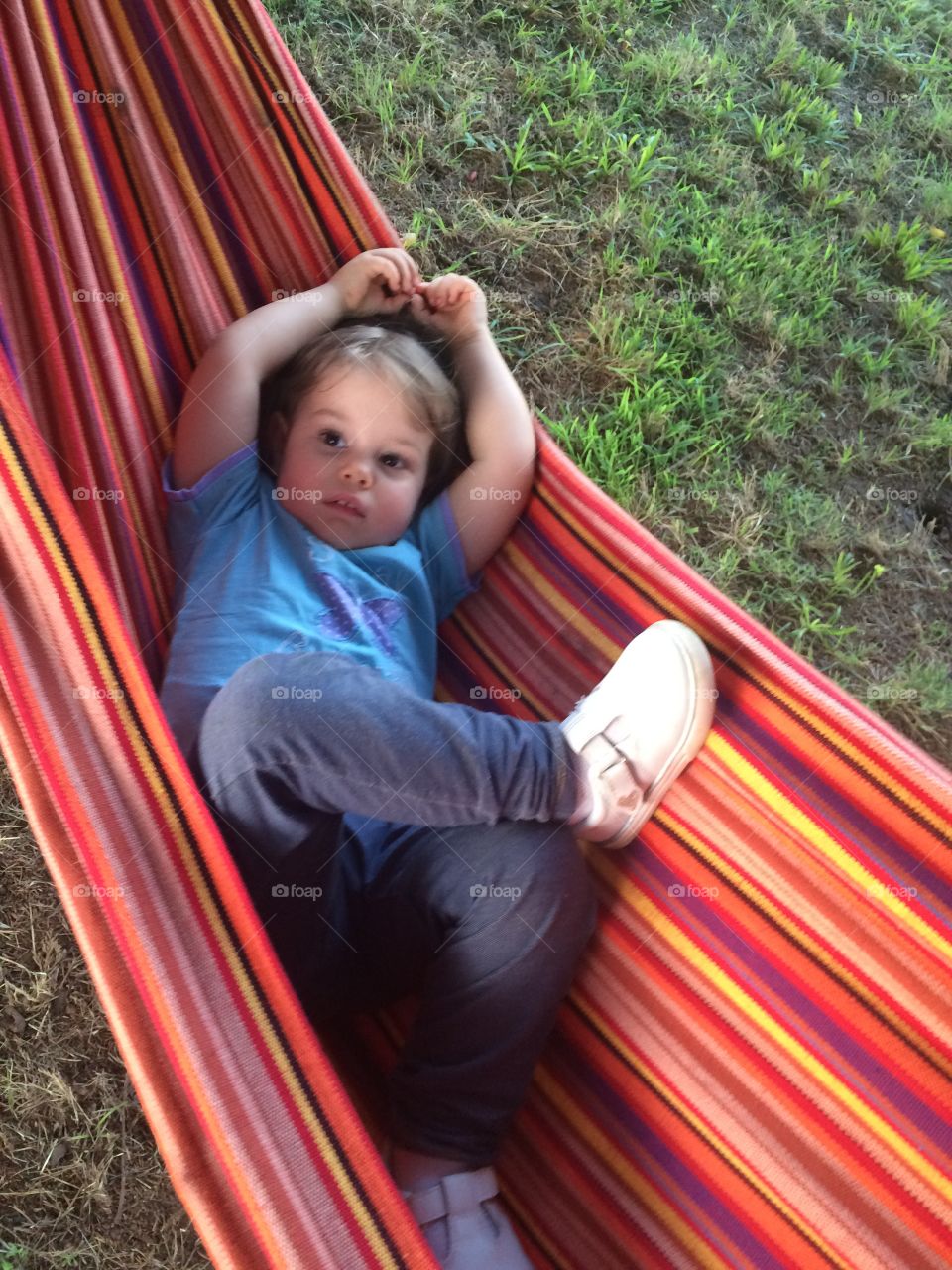 Girl in a hammock totally relaxed
