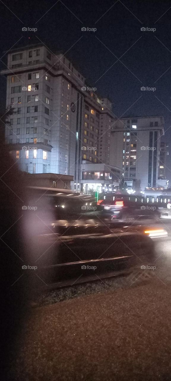 Twinkling windows , the beauty of evening light. Bask in the beauty of evening light with the view of light twinkling from these windows at night