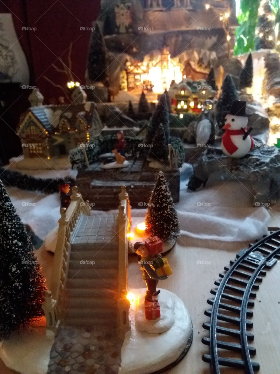 bridge lights christmas houses village snow train trees