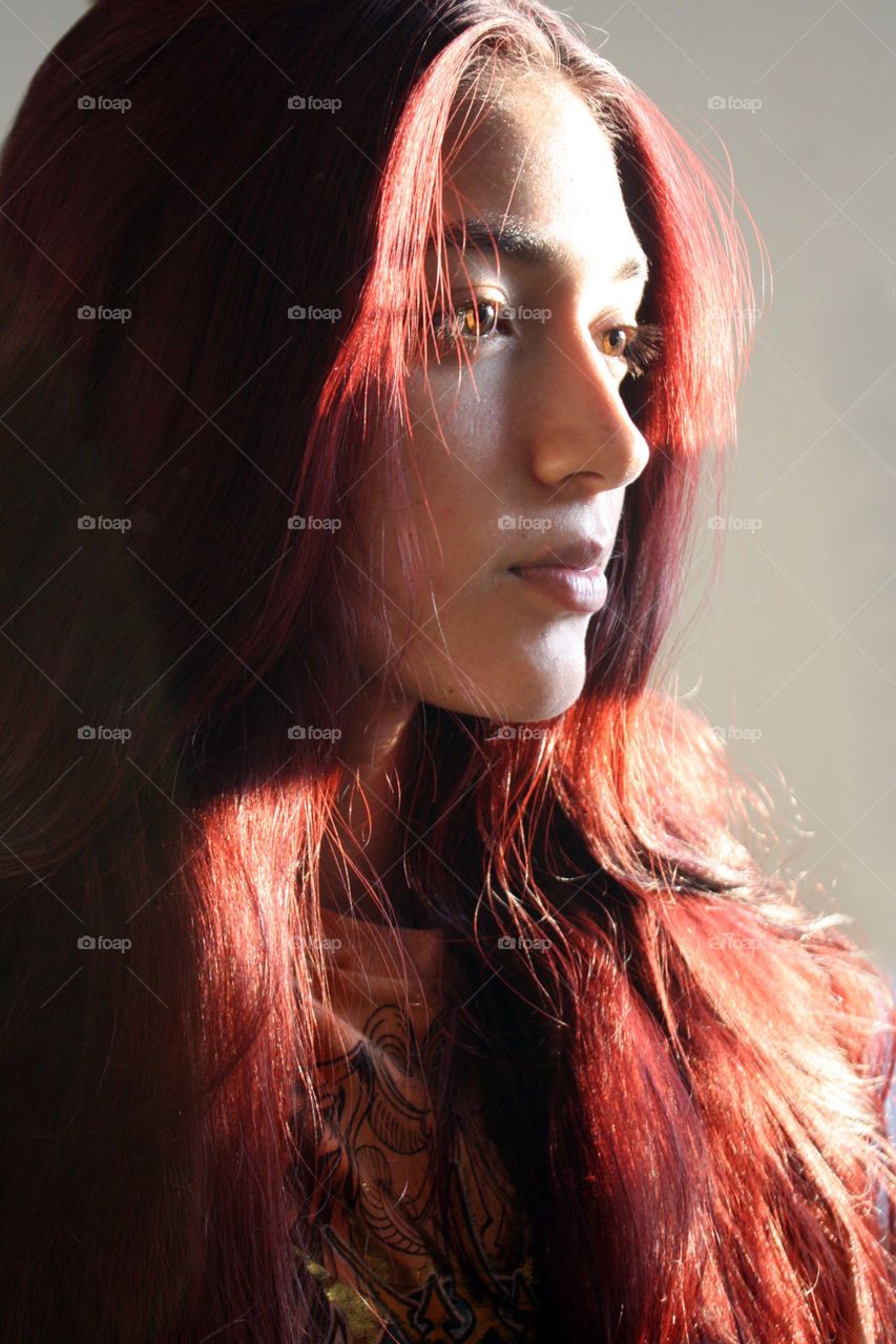 Portrait of a beautiful redhead teen girl