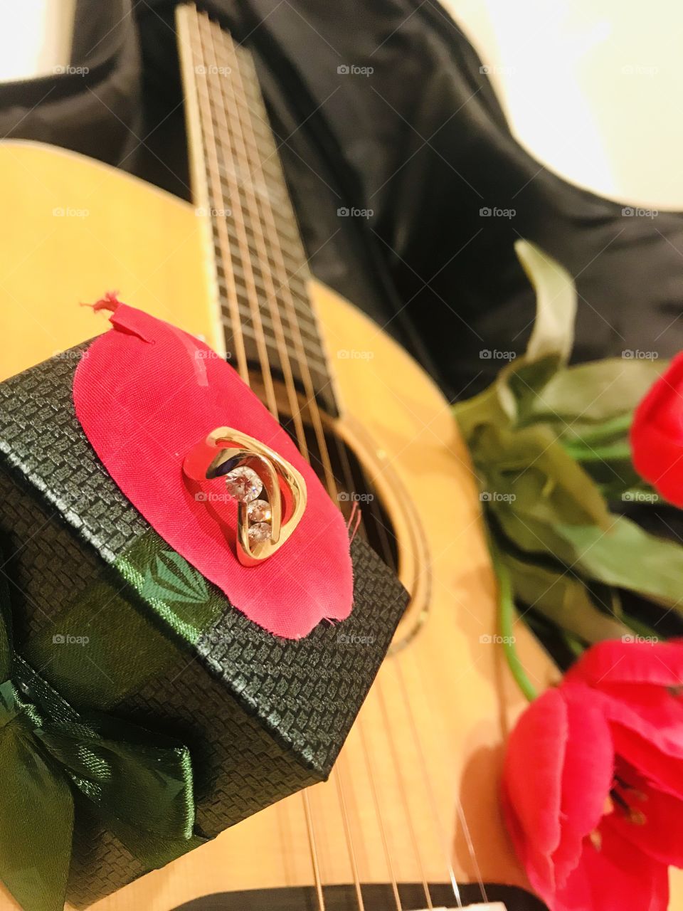 Taking a weekend getaway to propose to the love of my life by serenading her with my guitar! 