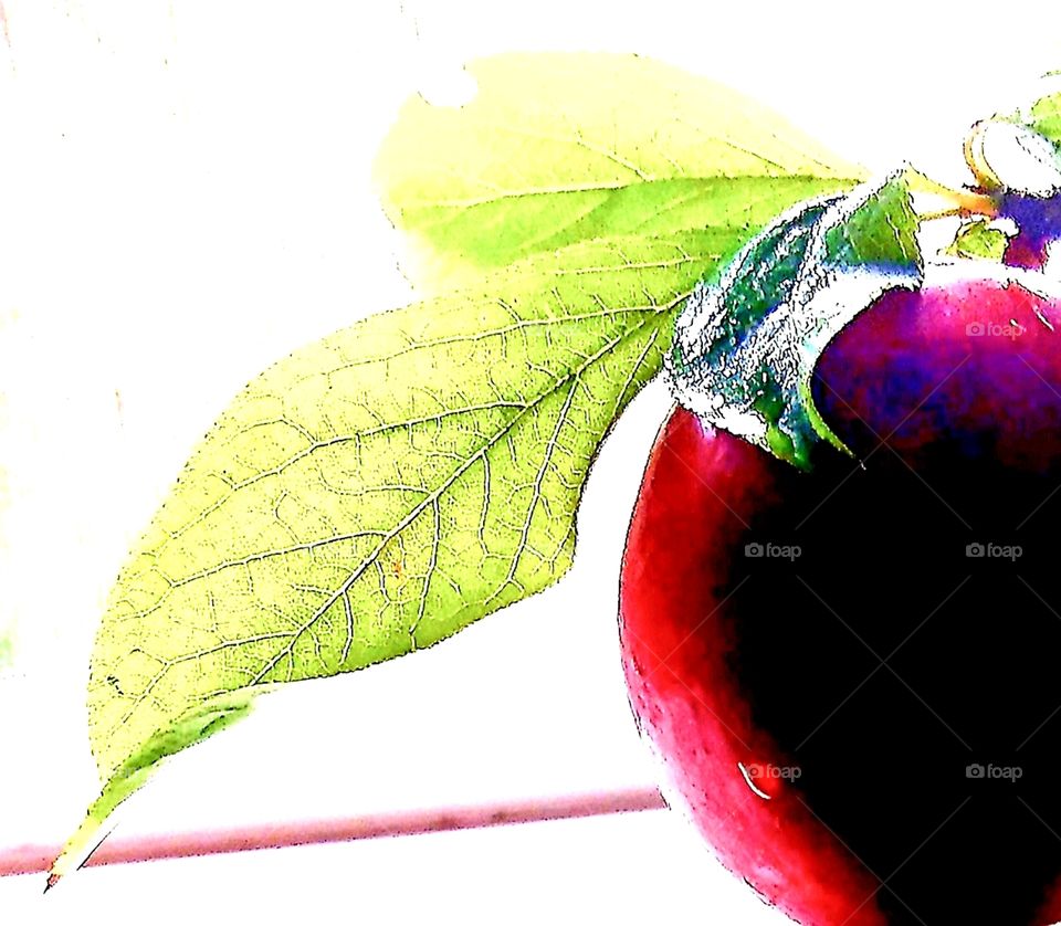 plum on the window sill