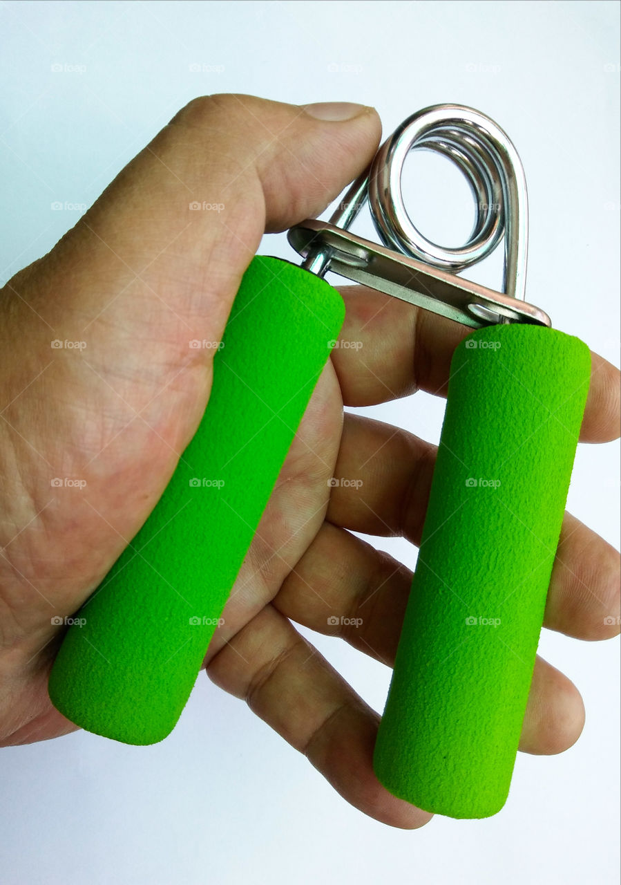 Finger-hand exerciser white background.