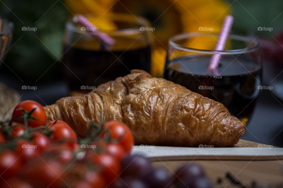 Croissant brad served with cold drink