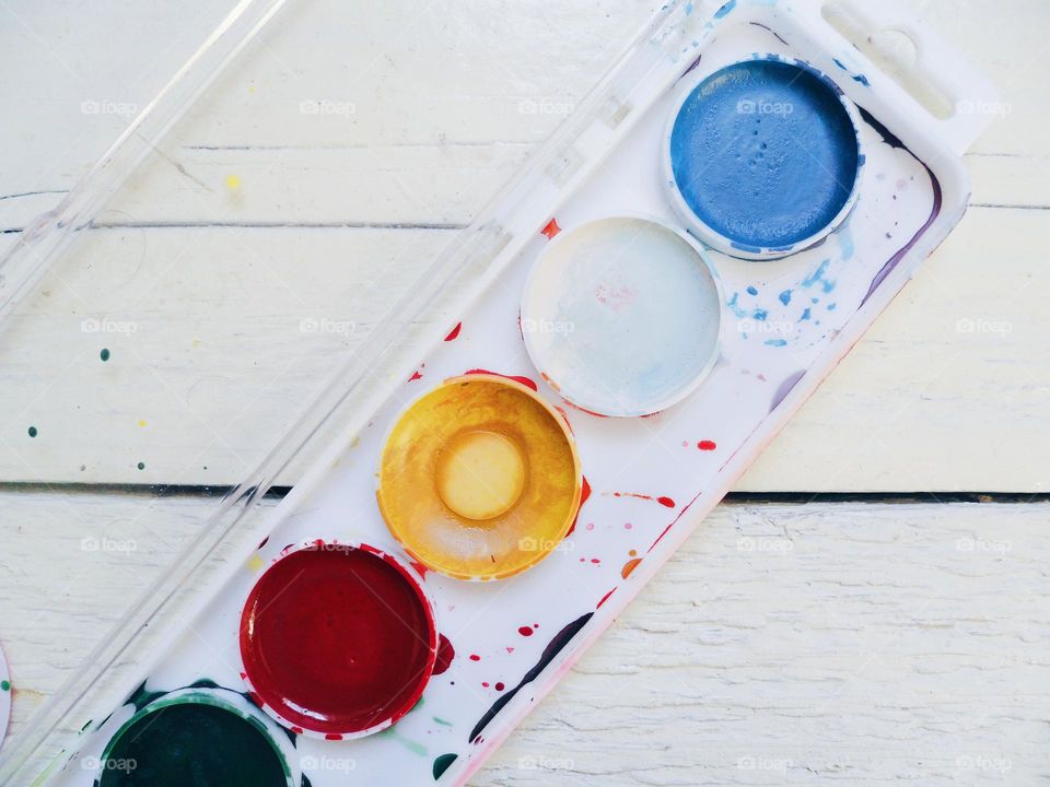 multicolored watercolor paints