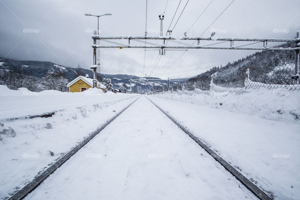 Train tracks covered in snow in Norway 