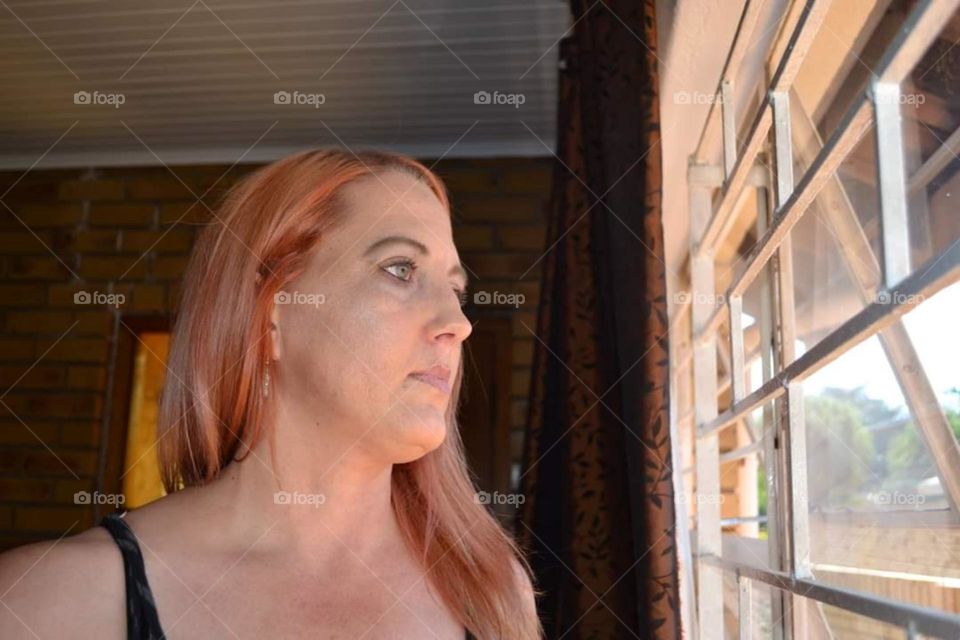 standing at a window