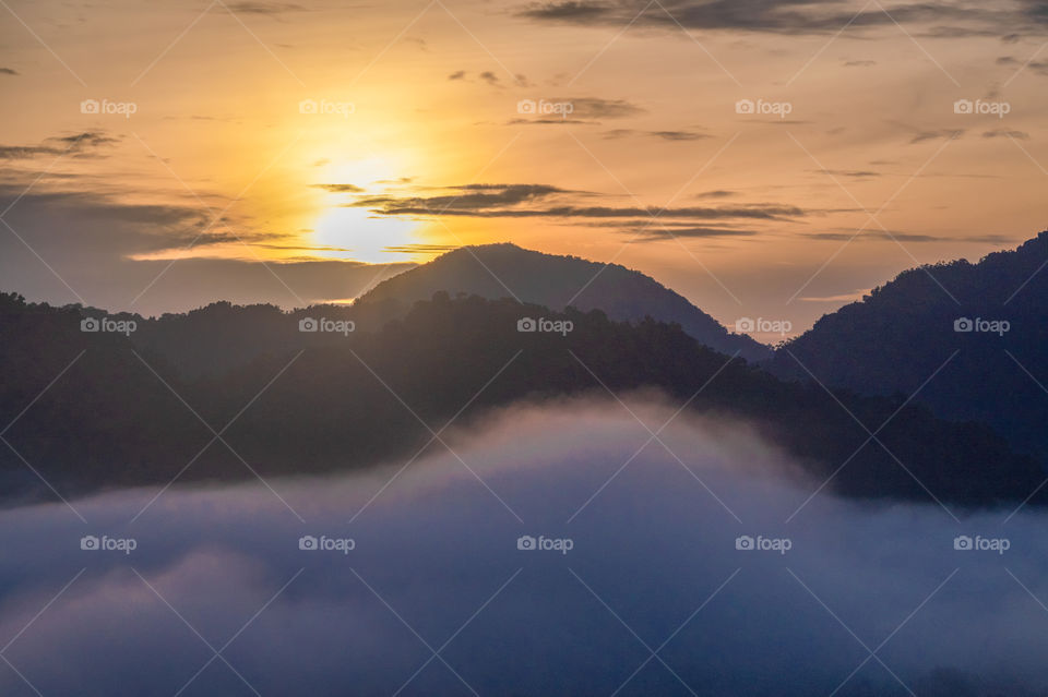 Sunrise above mountain scape