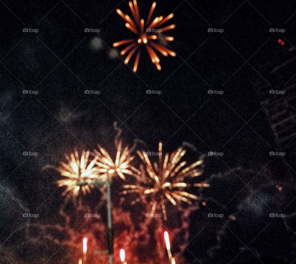 The once dark, gloomy night sky was suddenly filled with bright, radiant colors. Everyone gathered around for a fun-filled night at the park. ✨