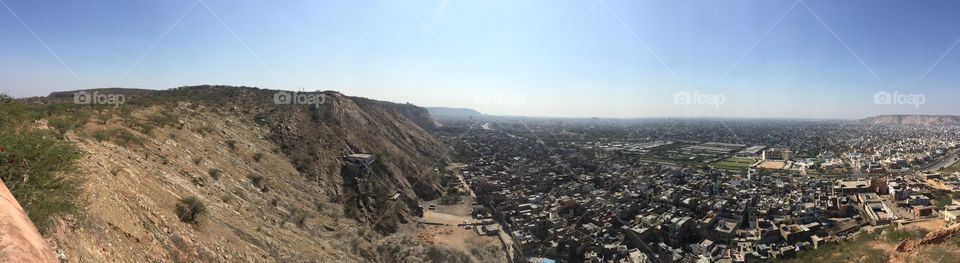 Beautiful City surrounded by rocky hills 