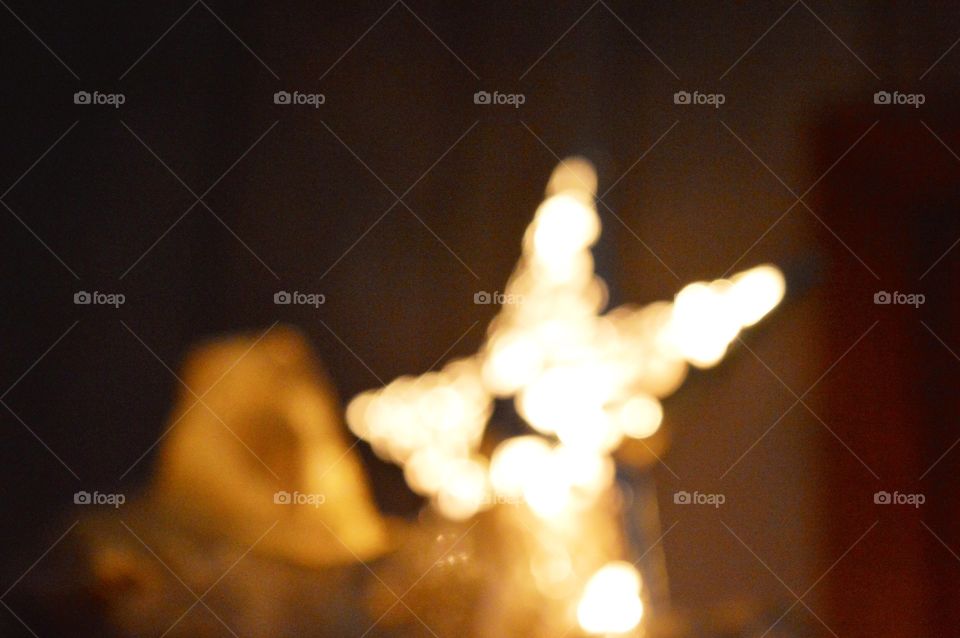 Blurred gold star 