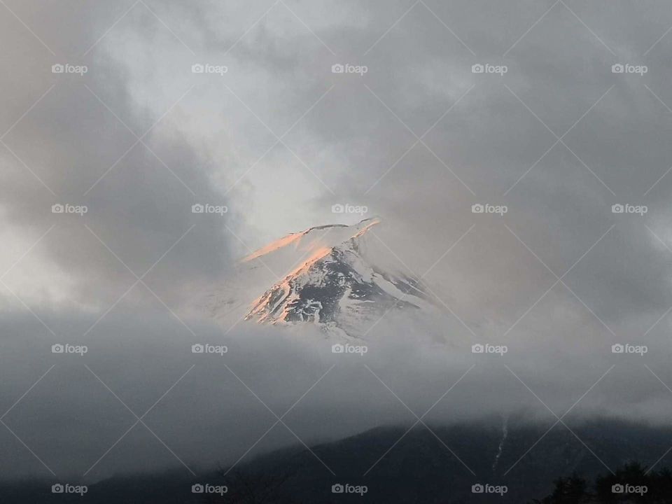mt. fuji hiding in winter cloud