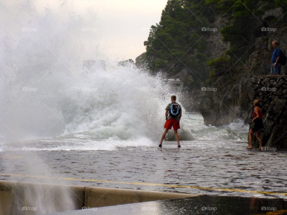 Waves crashing in positano italy