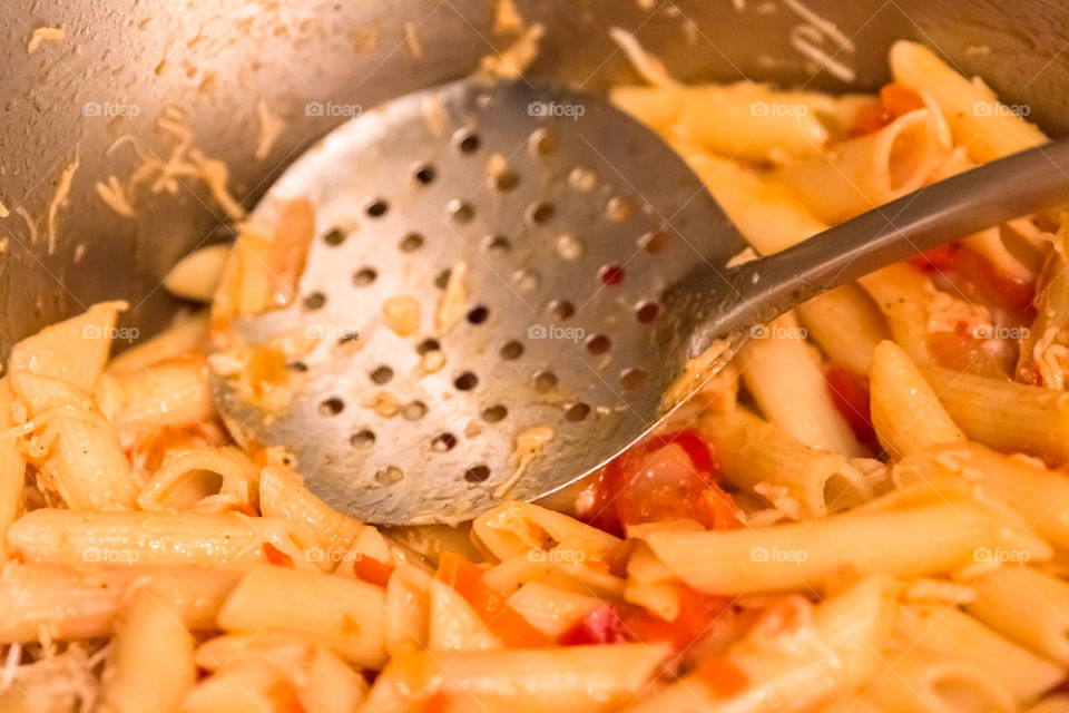 Close-up of preparing pasta