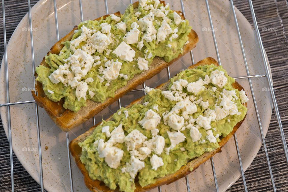 Healthy breakfast - avocado feta toast 