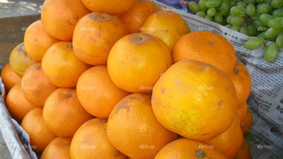 In the orange shop, which is very tasty in food and also for health.