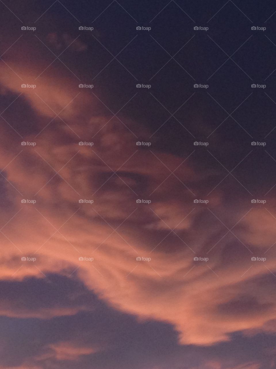 Low angle view of a dramatic sky at the time of sunset