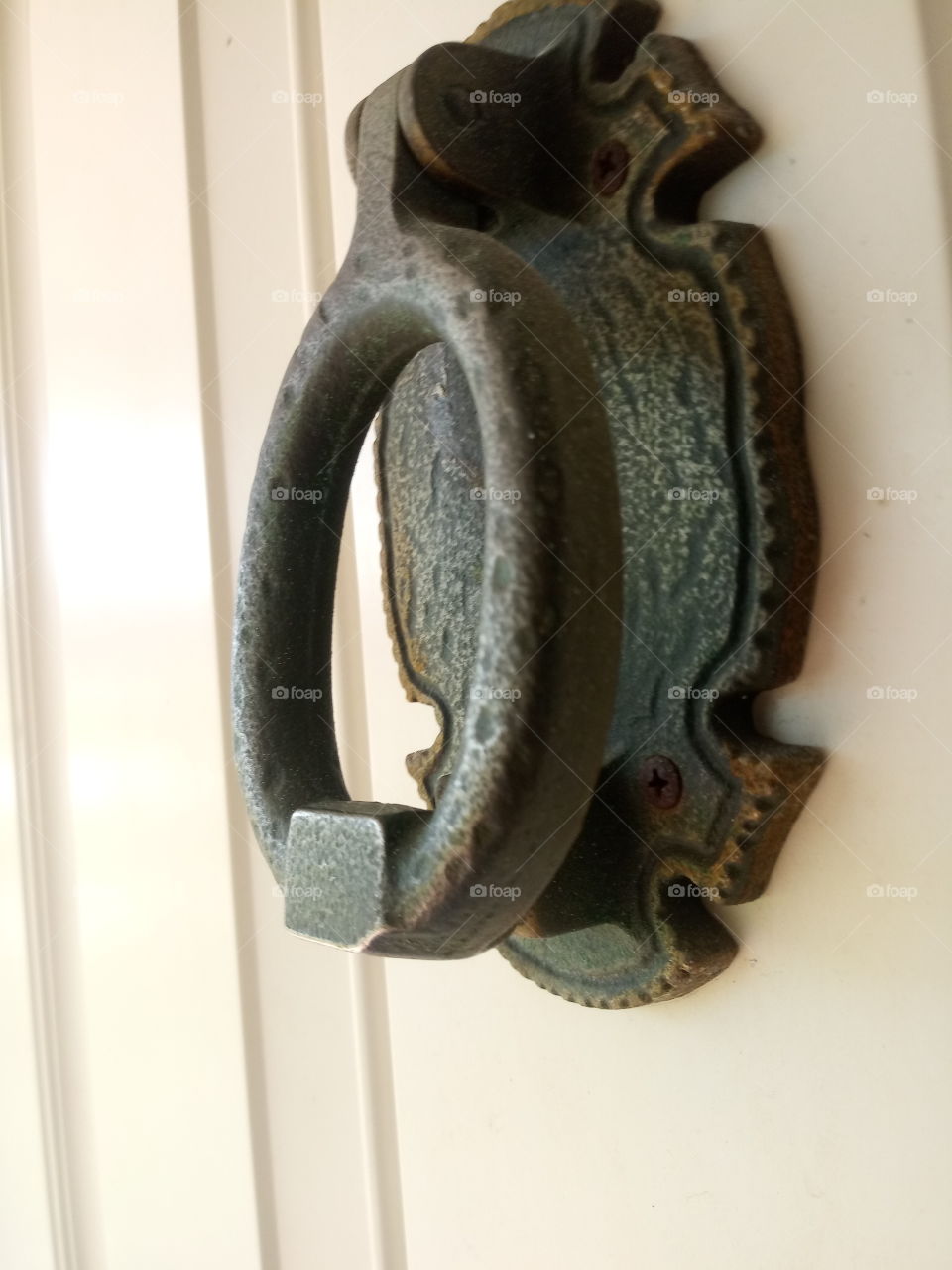 an aged door knocker