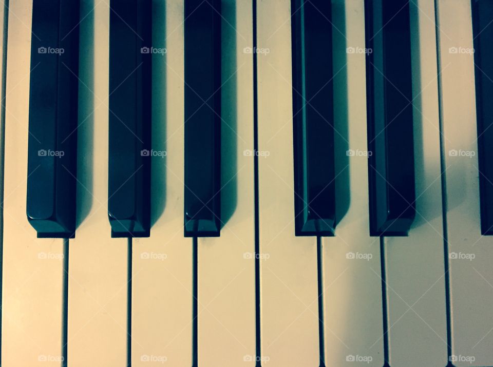 Above old piano keys