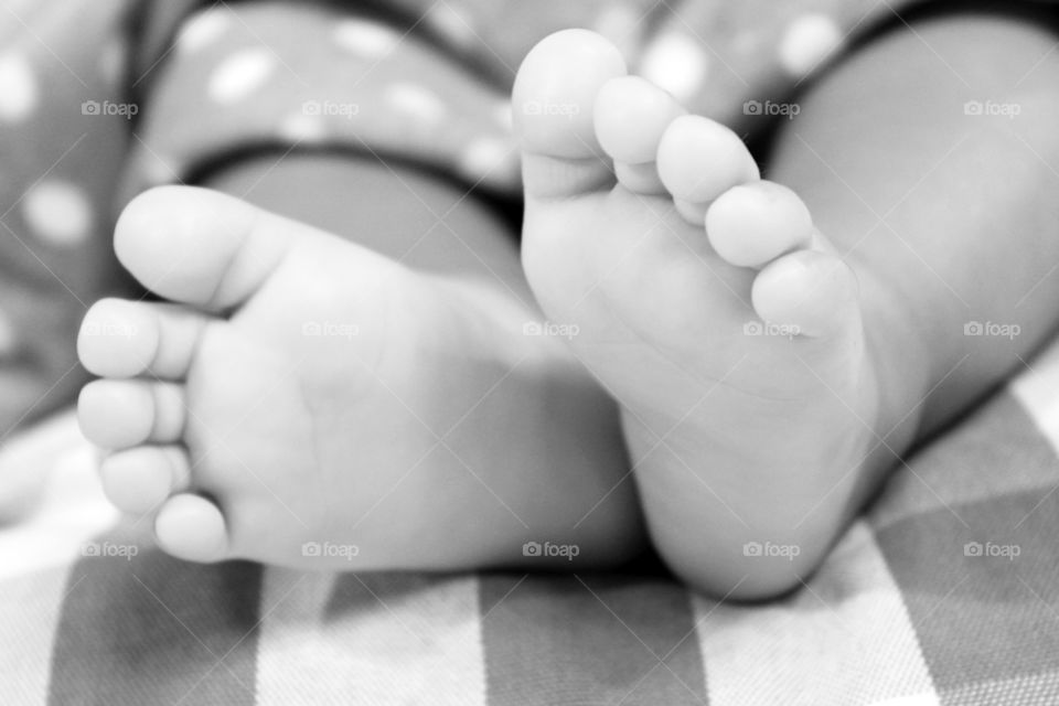 Baby feet. This child will walk through life.