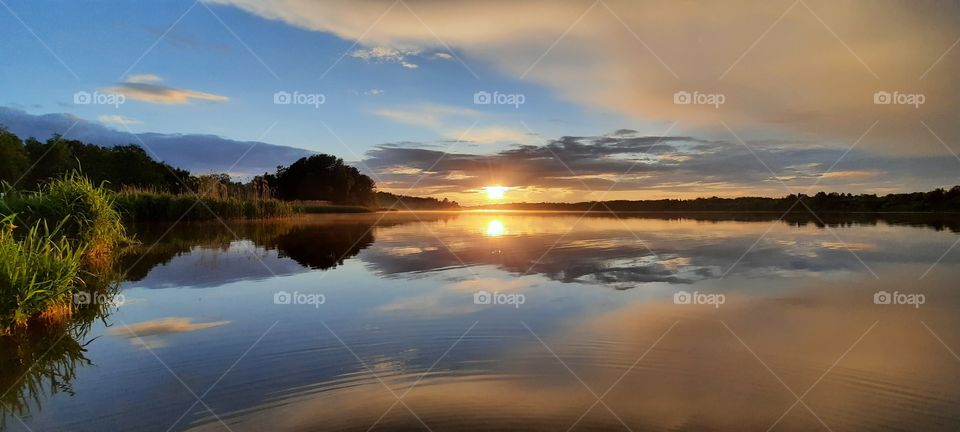 beatiful reflection of the sun set