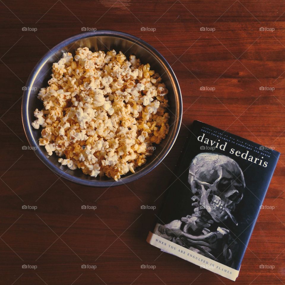 Snack time. Light reading from David Sedaris