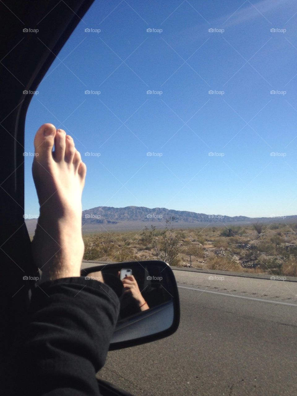Foot out the window