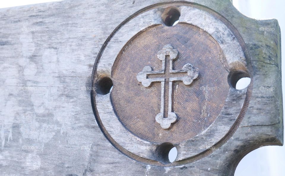 Cross symbol in wood