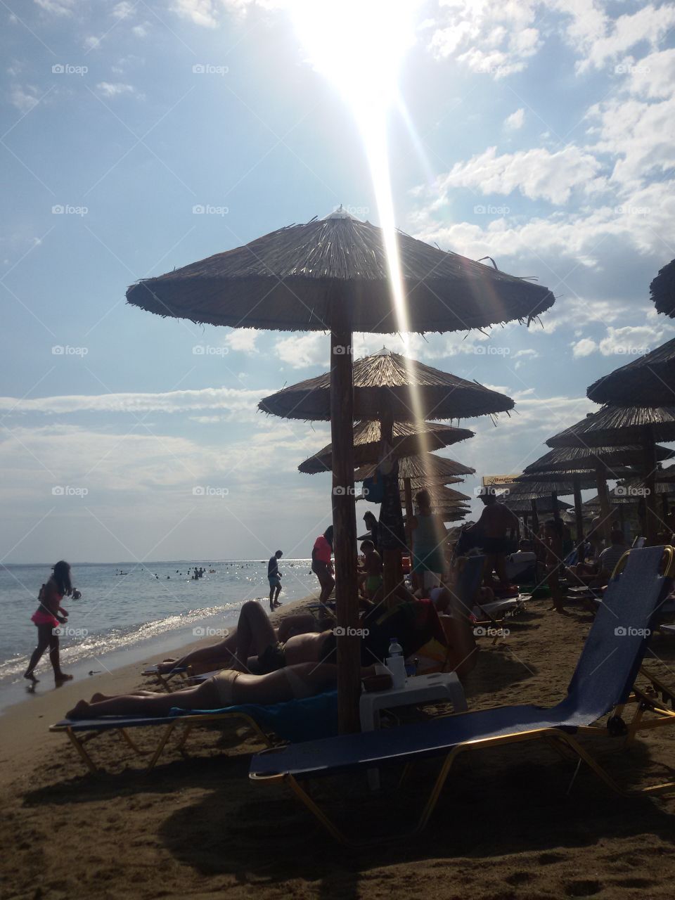 Sun rays on the beach