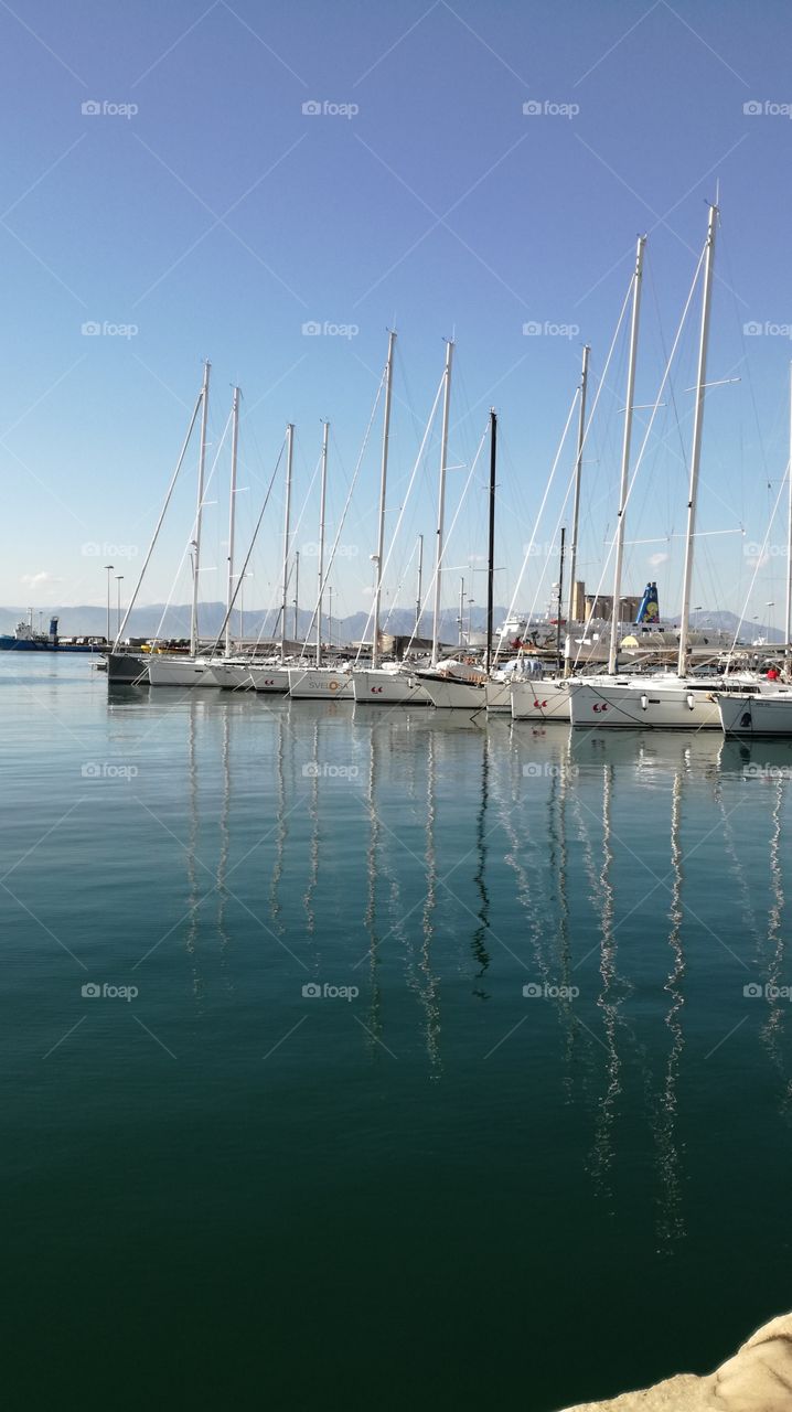 reflections in cagliari port