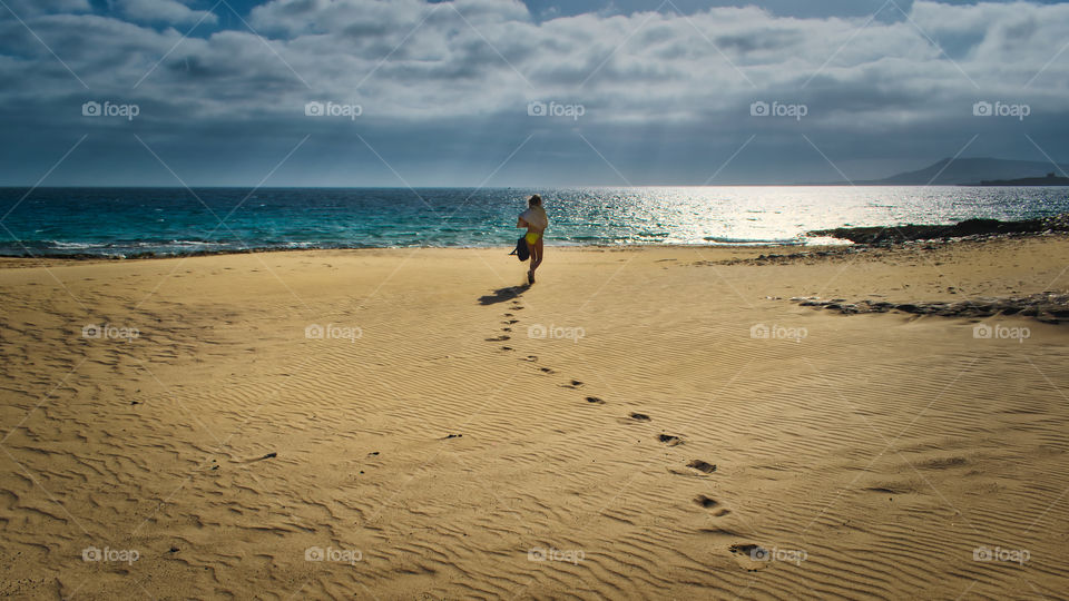 Walking down the beach