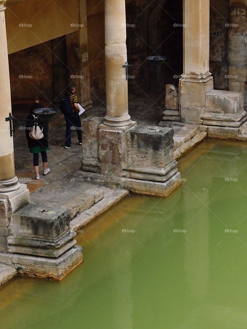 The grand architecture of the Roman Baths in Bath in England on a summer day during travels