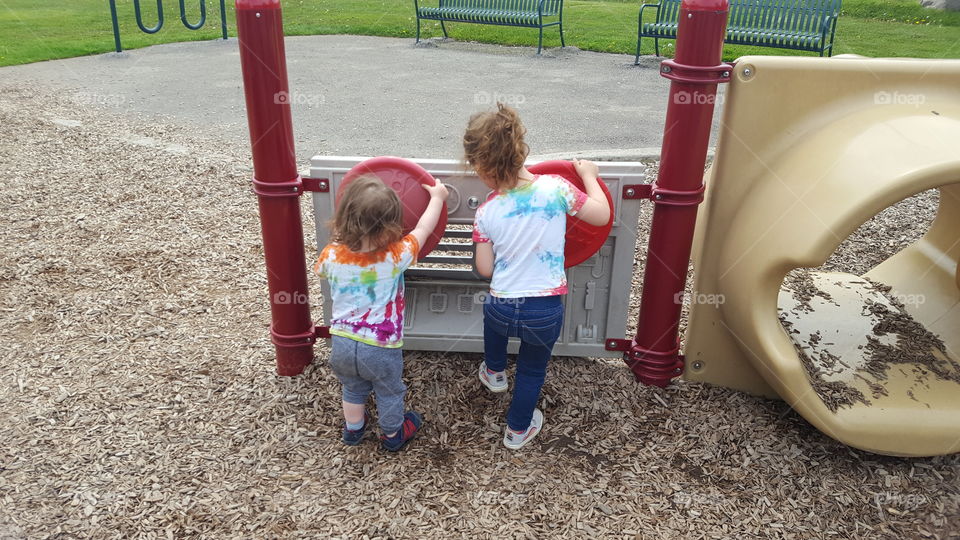 sisters at the playground