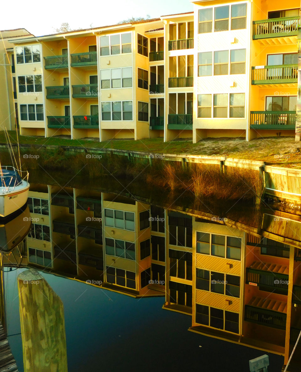 Building reflecting on the lake