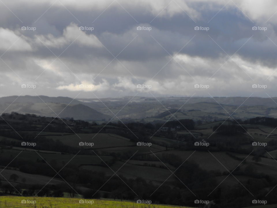 Stormy clouds over some hills in Wales, UK