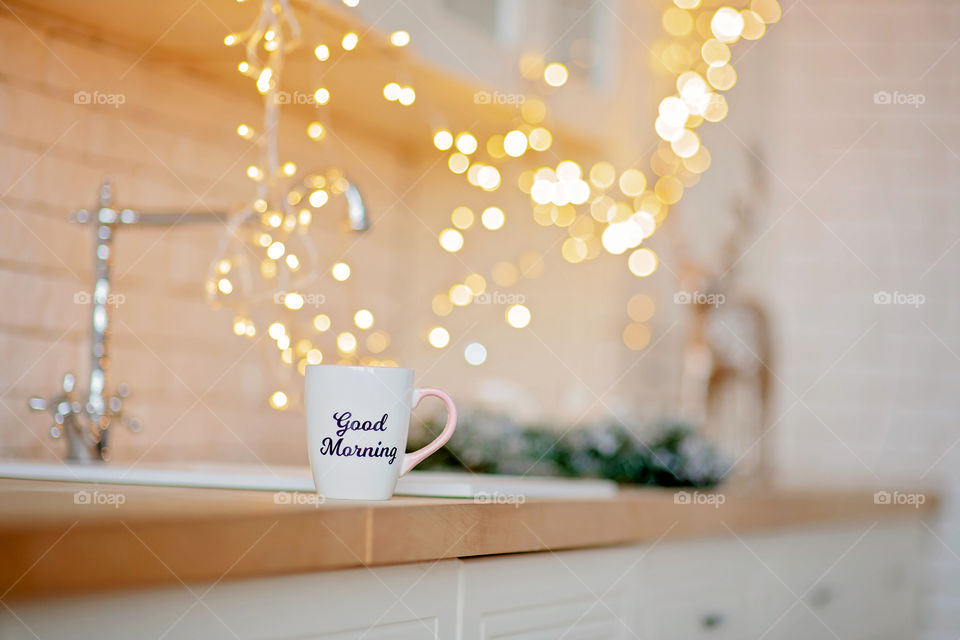 cup of coffee in a cozy festive Christmas atmosphere