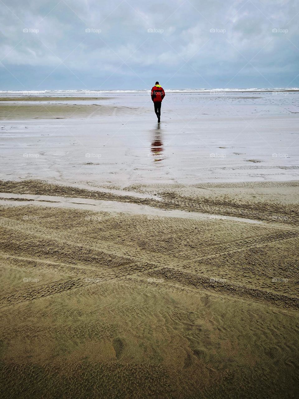 One person walking on the beach of Terschelling, a beautiful Dutch island 