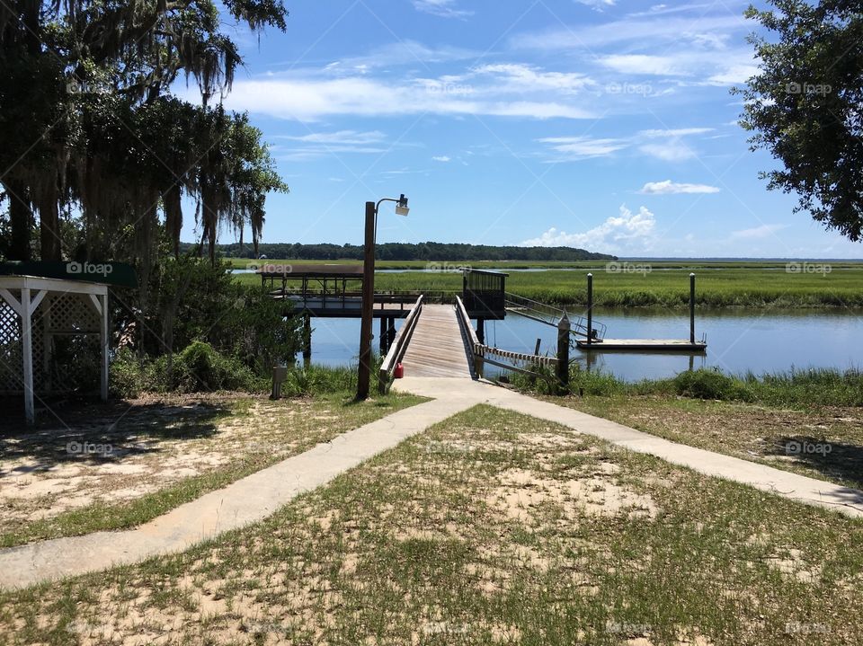 Paths to the dock over the water.