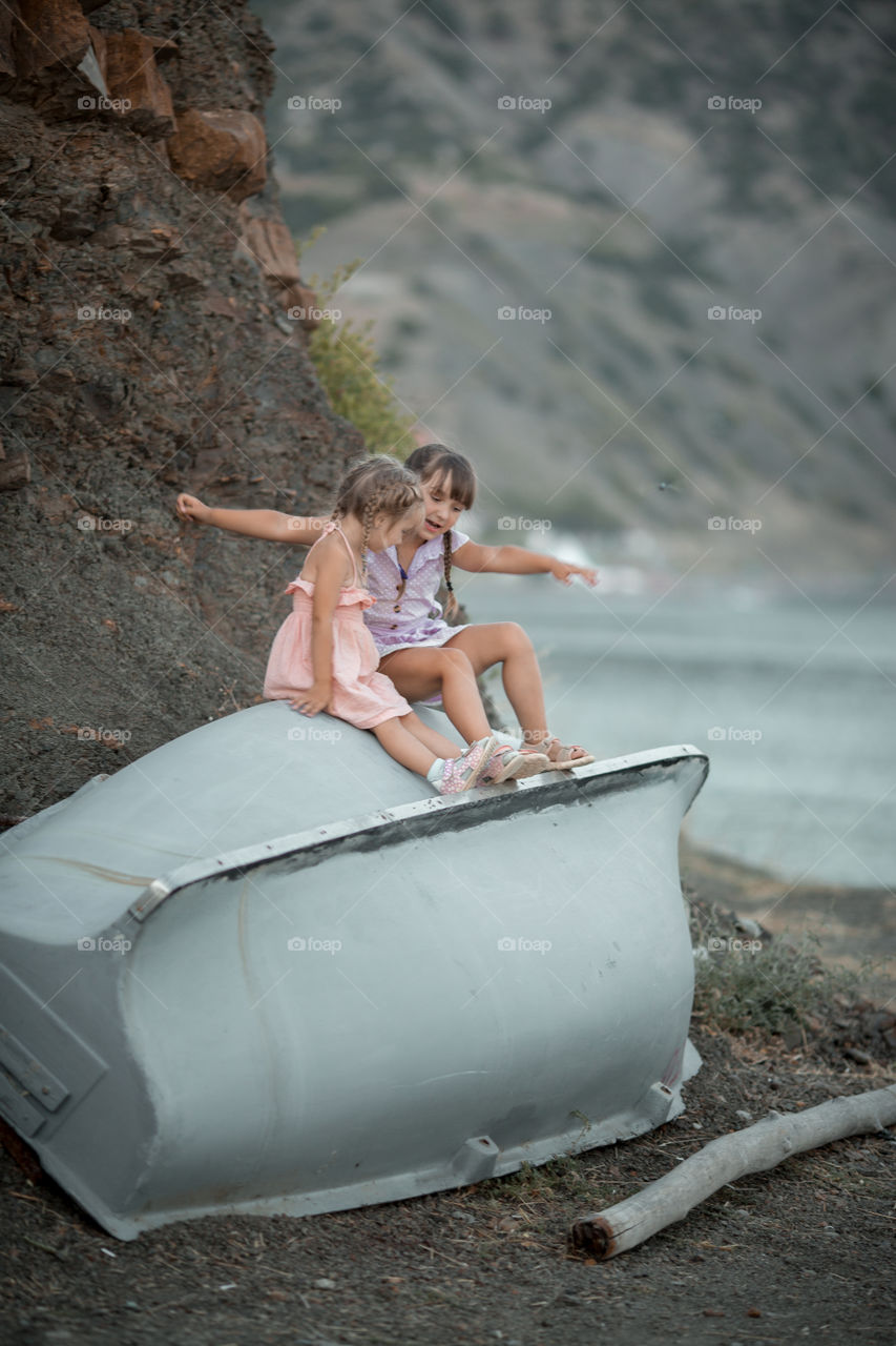 Little sisters playing outdoor